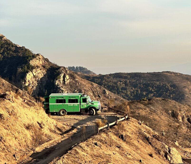 Showing the Little Tujunga Interagency Hotshot Crew buggy in the Eaton Fire burn scar.