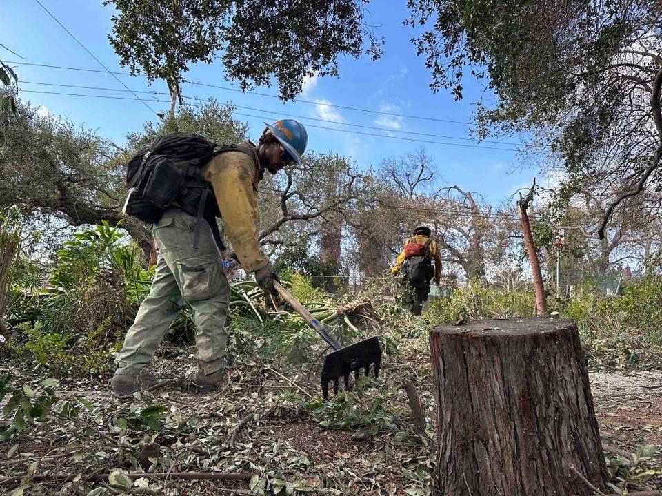 Crews with Klamath Falls, Ore. Lost River Fire Management Service clear brush along Altadena Drive support suppression repairs efforts on the Eaton Fire Management Service