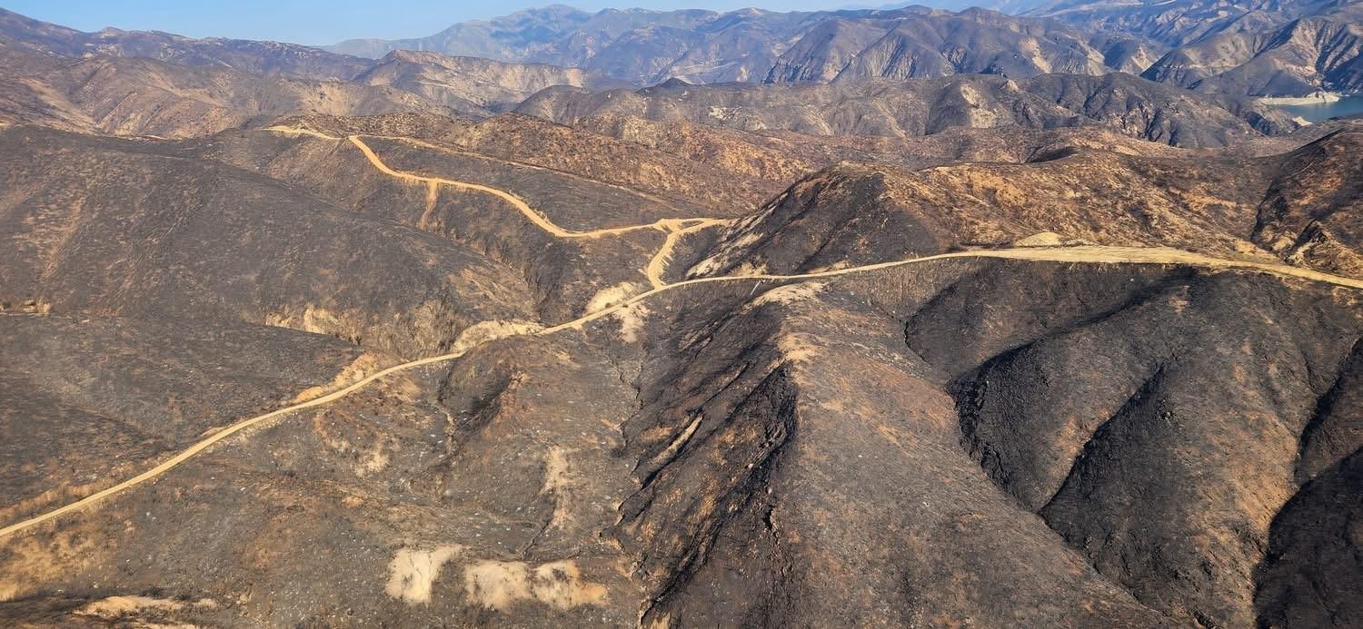 photo showing BAER Specialists Assess Hughes Burn Area by Aerial Reconnaissance