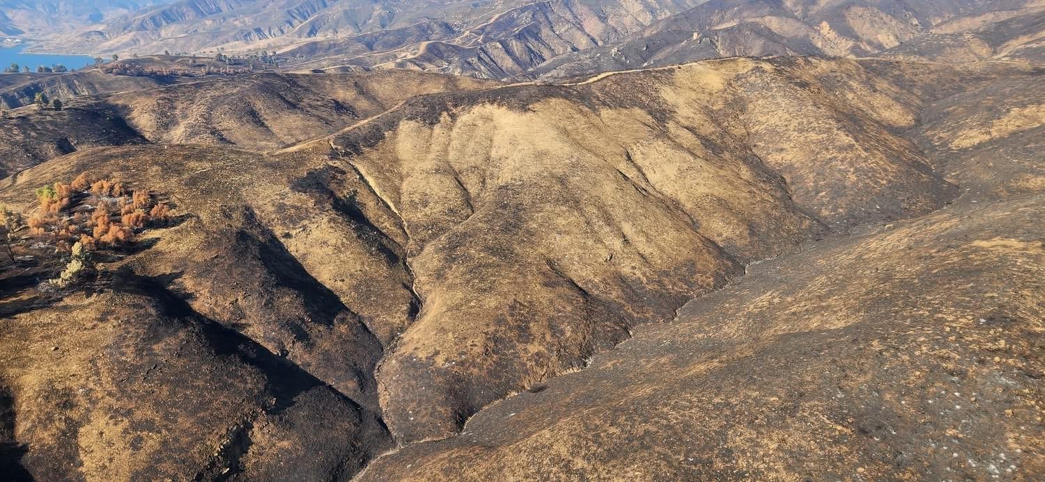 photo showing BAER Specialists Assess Hughes Burn Area by Aerial Reconnaissance