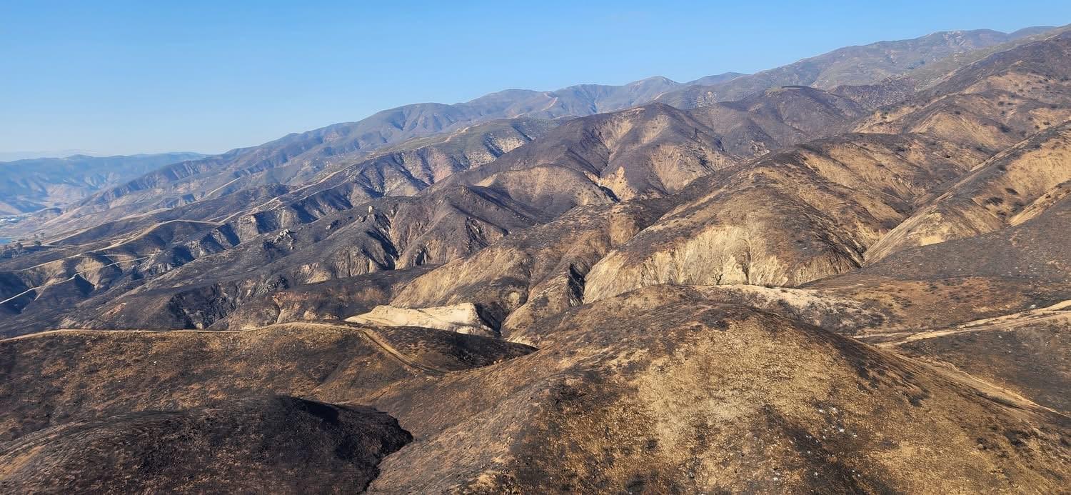 photo showing BAER Specialists Assess Hughes Burn Area by Aerial Reconnaissance