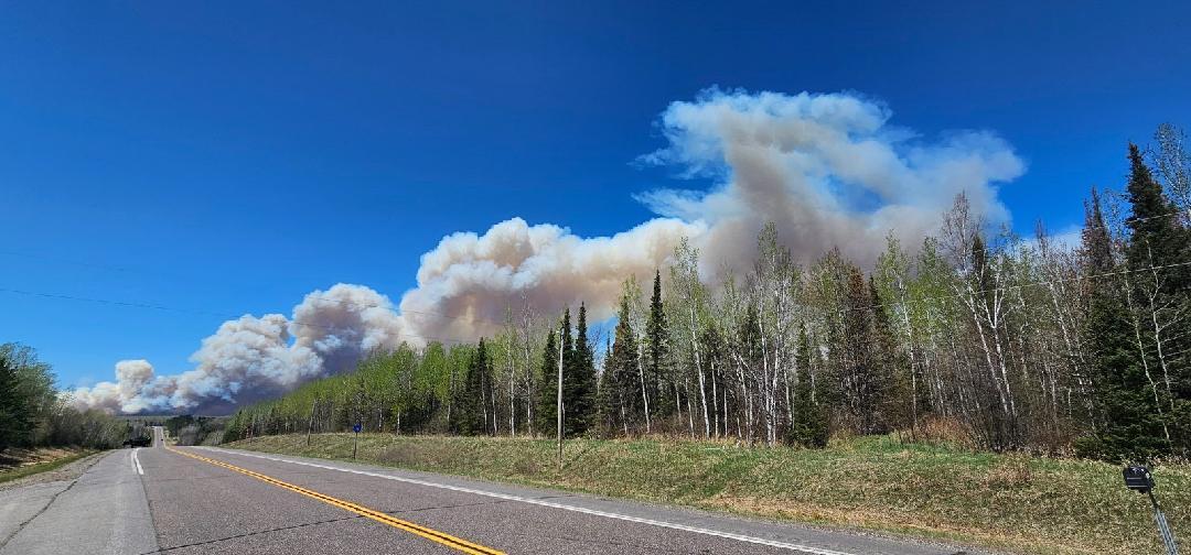 Smoke from the Camp House Fire seen above the trees along Highway 16.