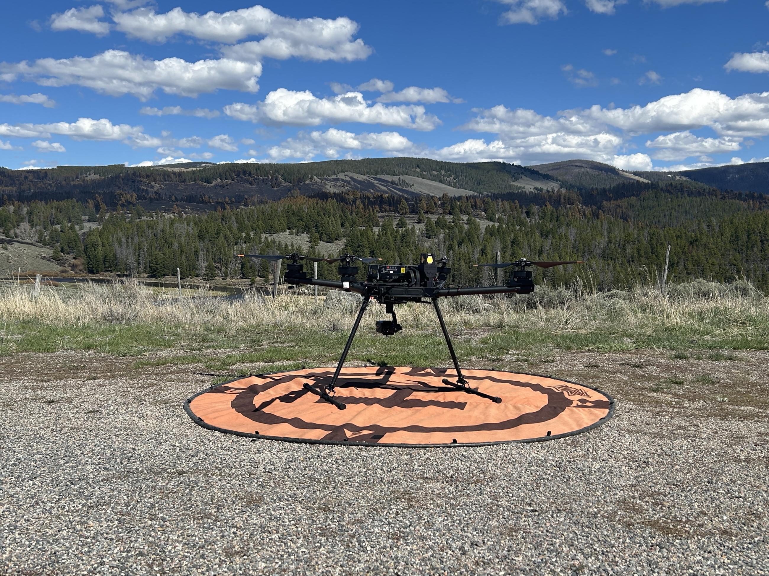 Drone on an orange landing pad