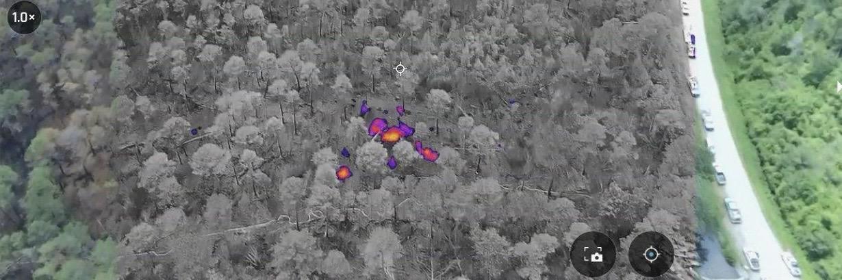 Drone photos show areas of remaining heat