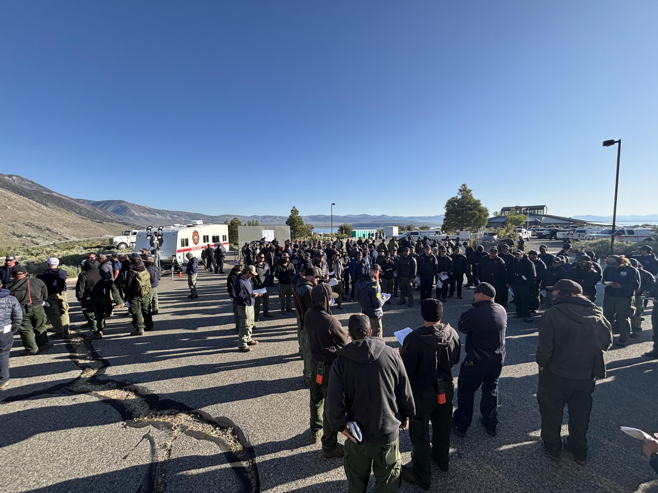 people gathered together, trailers, sky